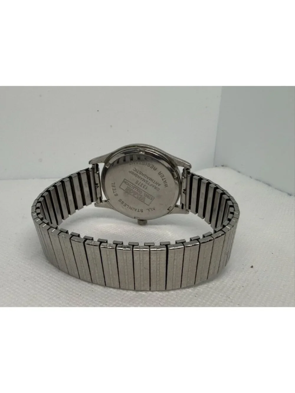 Visage Quartz Wristwatch Silver Dial Textured Center Roman Numerals 13370